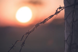 sunset behind the fence P6CM3NV 300x201 - Accueil | Avocat International et Européenne des Droits de l'Homme à Strasbourg | Me THUAN Dit DIEUDONNÉ